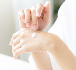 Jewellery safely set aside before applying lotione.